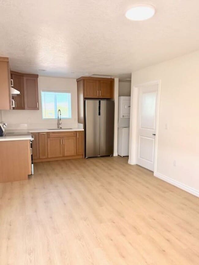 Photo - Spacious 3BR/2BA Home with Open Floor Plan, Garage & Washer/Dryer Unit Upstairs ADU
