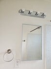 Vanity light and medicine cabinet - 4138 Redondo Beach Blvd Apartments Unit A