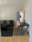 Livingroom - 1400 W Olympic Blvd Apartments Unit A