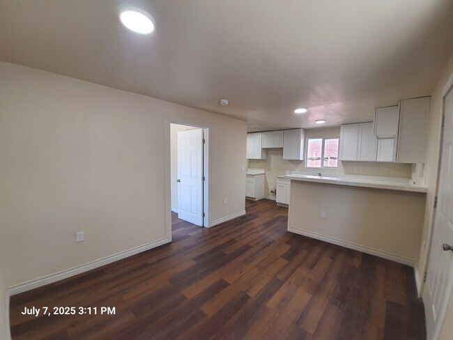 Living room / kitchen - 1221 W 152nd St Apartments
