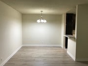 Dining Area - new wood floor - 325 S Doheny Dr Apartments