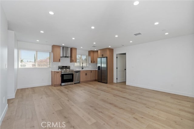 Building Photo - 11142 Woodley Ave Unit 1/2