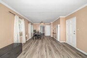 3BR, 2BA - 1,200SF - Living Room - 1554 S Stanley Ave