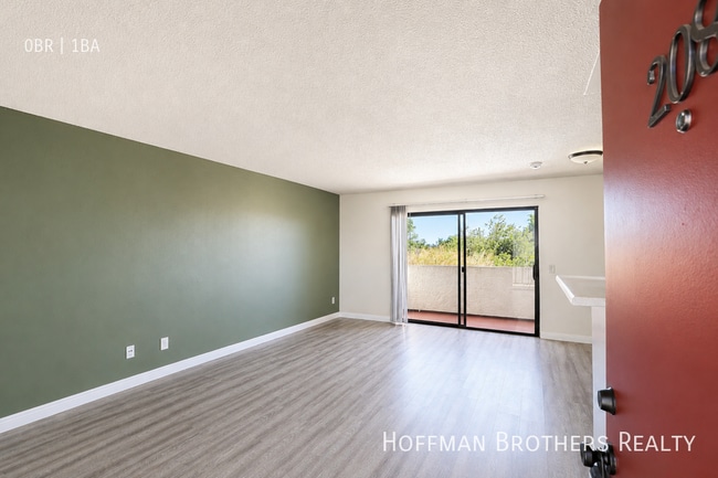 Building Photo - 11120 Arminta St Unit 208