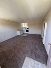 Living room from front door - 2133 Elden Ave Unit Elden East Apartments