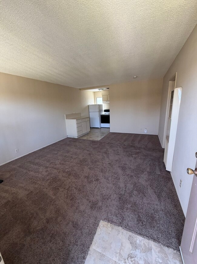 Living room from front door - 2133 Elden Ave Unit Elden East Apartments