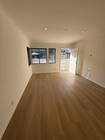 Remodeled living room - 1543 11th St Apartments Unit D