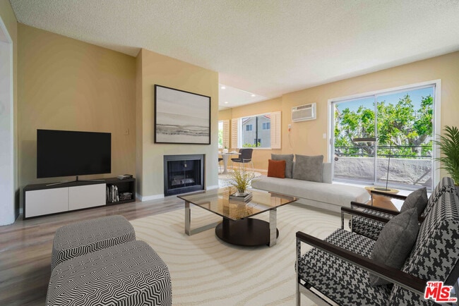 Building Photo - 11871 Idaho Ave Unit 8