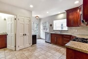 Kitchen with view to back door - 8459 W 4th St