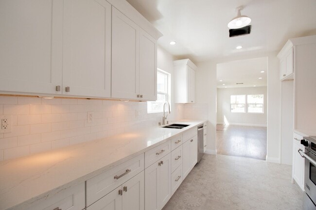 Photo - 17016 Van Ness Ave