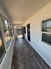Front sunroom/enclosed porch - 4156 W 161st St House