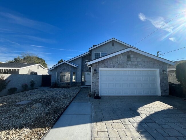 Building Photo - Reseda 4+3 w/fireplace, vaulted ceilings, new flooring, solar panels, + pool!