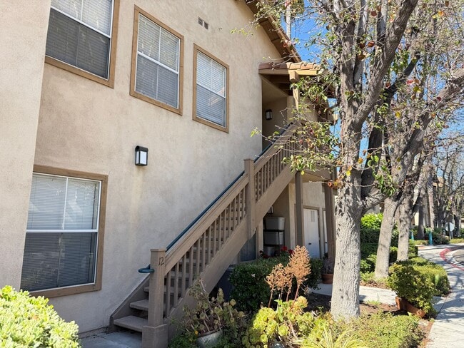 Building Photo - BEAUTIFULLY REFRESHED UPPER-LEVEL CONDO WITH GARAGE & RESORT-STYLE AMENITIES