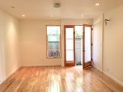 Large bedroom hardwood floors/French Doors - 12116 Ohio Ave Unit 12116