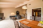 Dining area and living room made bright by large sliding glass doors and windows. - 2838 Luciernaga St