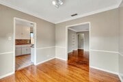 View from Dining room into kitchen and living room - 2211 W 102nd St Apartment Unit Front