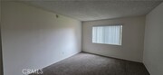 Photo - 6600 Warner Ave Unit 56