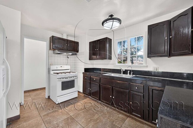 Photo - Charming 4 Bedroom Home with Private Yard & Garage Parking