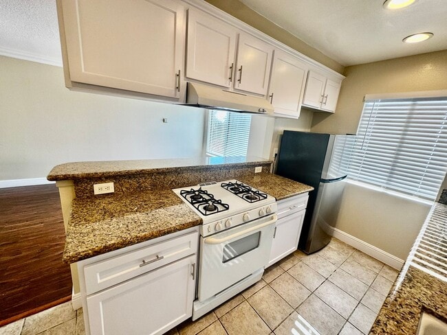 Photo - Updated 2nd Floor Corner Unit -3425 E. 15t... Unit 17-D