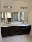 Photo - Charming 3BR Home with Modern Kitchen, Versatile Loft, & Private Backyard