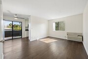 1BR, 1BA - 625SF - Living Room - Chateau Emelita Apartments