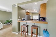 Photo - Welcome to this beautiful 1,042 sq. ft. condo offering modern comfort in a prime location! Unit B