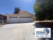 Photo - Spacious 4-Bedroom Home with Downstairs Bedroom & Brand-New Carpet