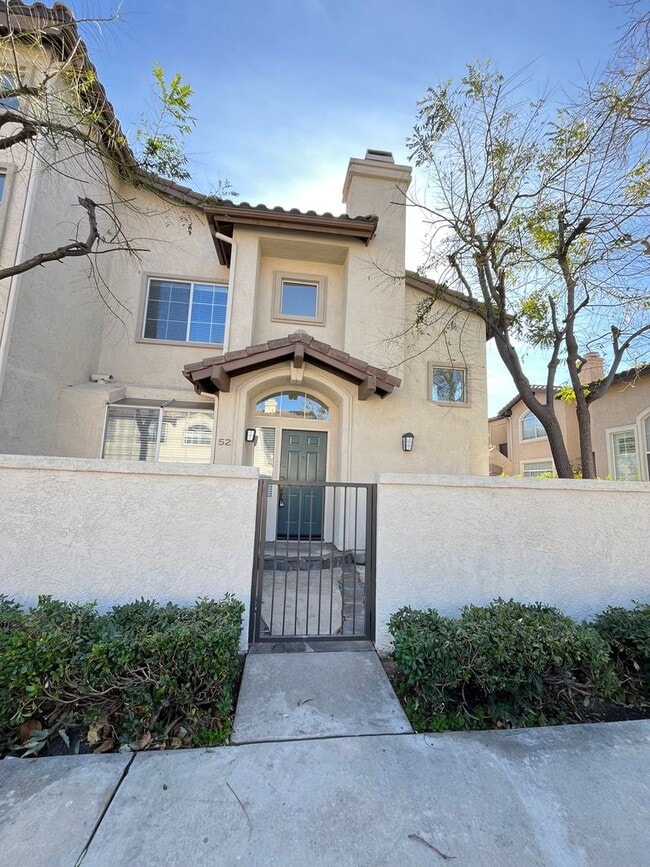 Building Photo - PICTURE PERFECT!  3 BR/3 BA END UNIT CONDO with DIRECT ACCESS 2 CAR GARAGE