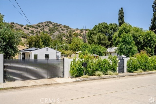 Building Photo - 10647 Tuxford St Rental