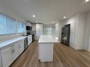 Photo - Completely remodeled 4+2 sprawled across a... House
