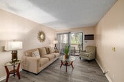 2BR, 2BA - 960SF - Living Room - Country Club Villas