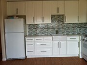 plenty of storage in kitchen cabinets - 5937 Mildred St House Unit 1