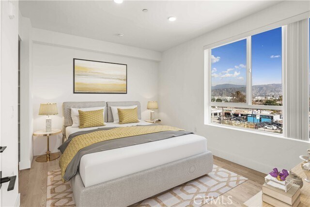 Photo - 11714 Archwood St Unit 204