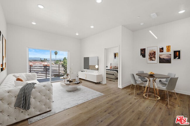 Building Photo - 7411 Artesia Blvd Unit 302 Rental
