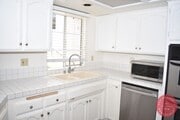 Photo - Charming 3-Bedroom Condo in the Heart of L...