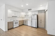 3BR, 2BA - 1,100SF - Kitchen - Mid-City Family Apts - Affordable Housing