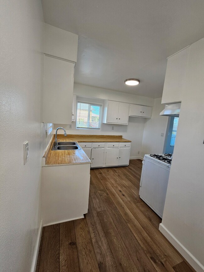 Photo - 1215 E 15th St Unit 1215 in a half