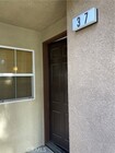 Photo - 8692 E 9th St Townhome