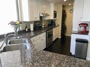 Washer and Dryer in Kitchen - 555 Esplanade Unit 517