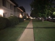 Front Walk Dusk North - 3181 S Barrington Ave Unit E