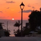 Sunset view from our walk street - 306 17th St Unit Beach Cottage