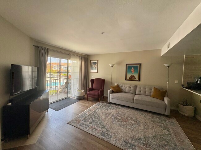 Living Room - 4750 Templeton St Unit 1201