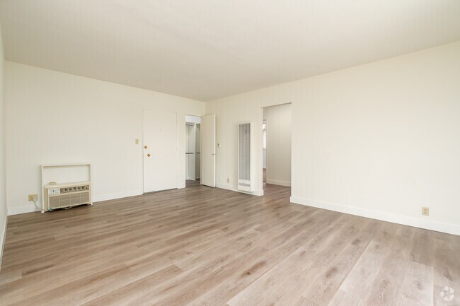 2BR, 1BA - 900SF - Living Room - 715 E. Providencia Ave