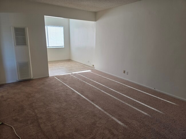 Living Room and Dining Area - 641 Border Ave Unit 4