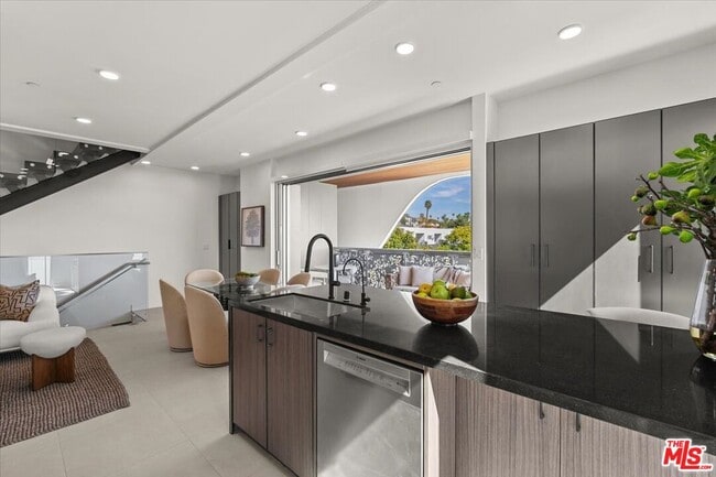 Building Photo - 1257 N Sweetzer Ave Unit 403