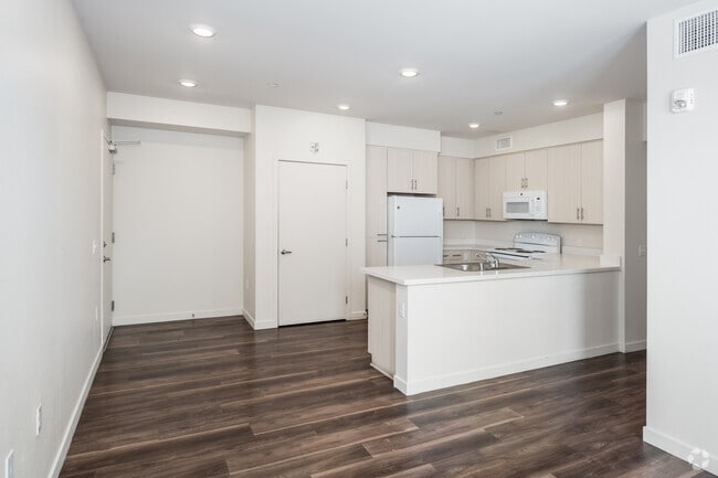 4BR, 2BA - 1,104SF - Kitchen and Living Room - Archways Santa Ana