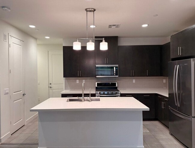 Photo - Stunning 3-Bed/2.5-Bath End Unit Condo with Solar & Large Yard