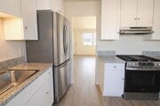 Photo - Recently Renovated, Single-Level 2-Bedroom Apartment with Small Fenced Yard. Unit O