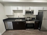 Studio Kitchen with Stainless Steel Appliances - Cloud Nine