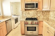 Kitchen - 210 S Spalding Dr Apartments
